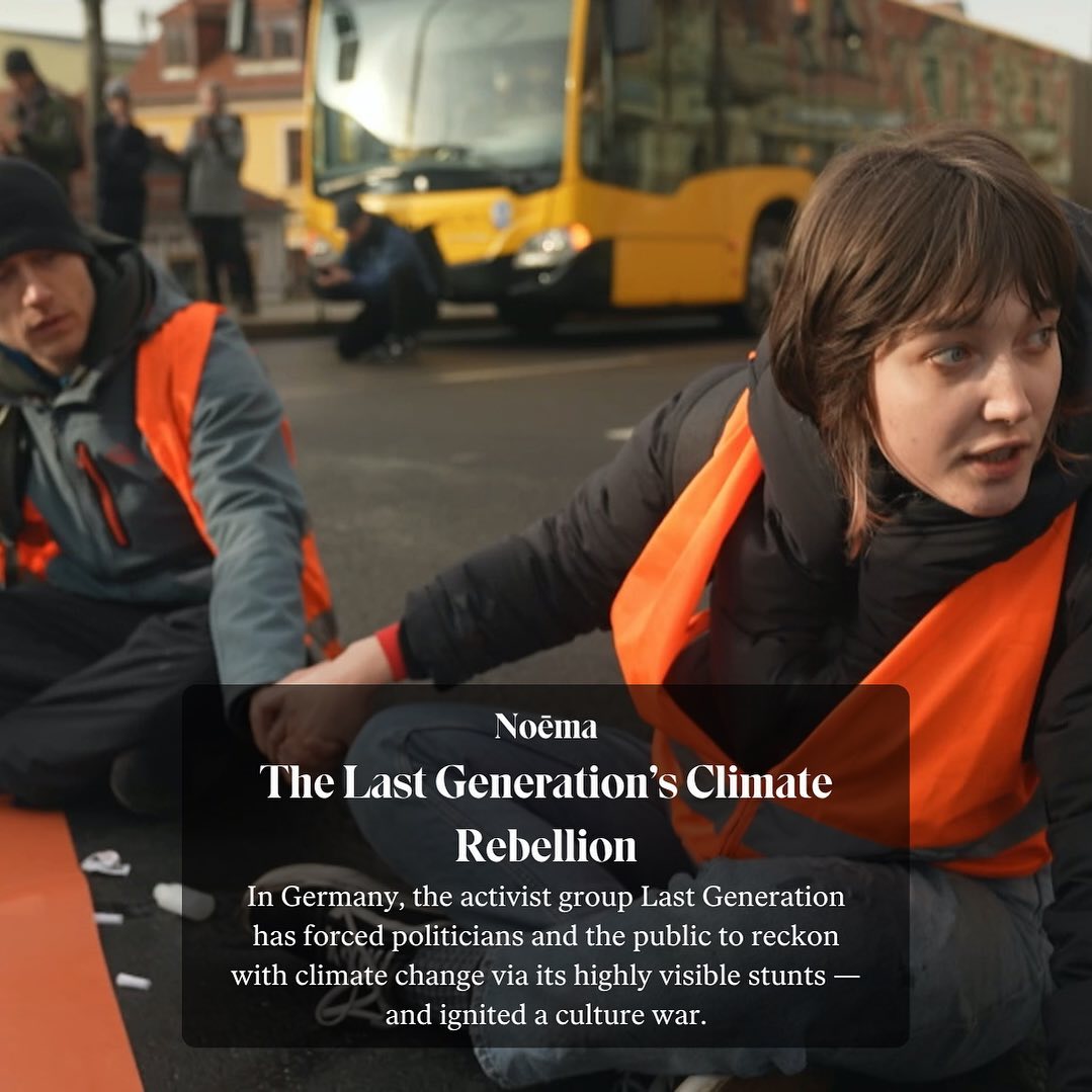 Climate activists sitting on the road in orange high-viz vests. Article “The Last Generation’s Climate Rebellion“.